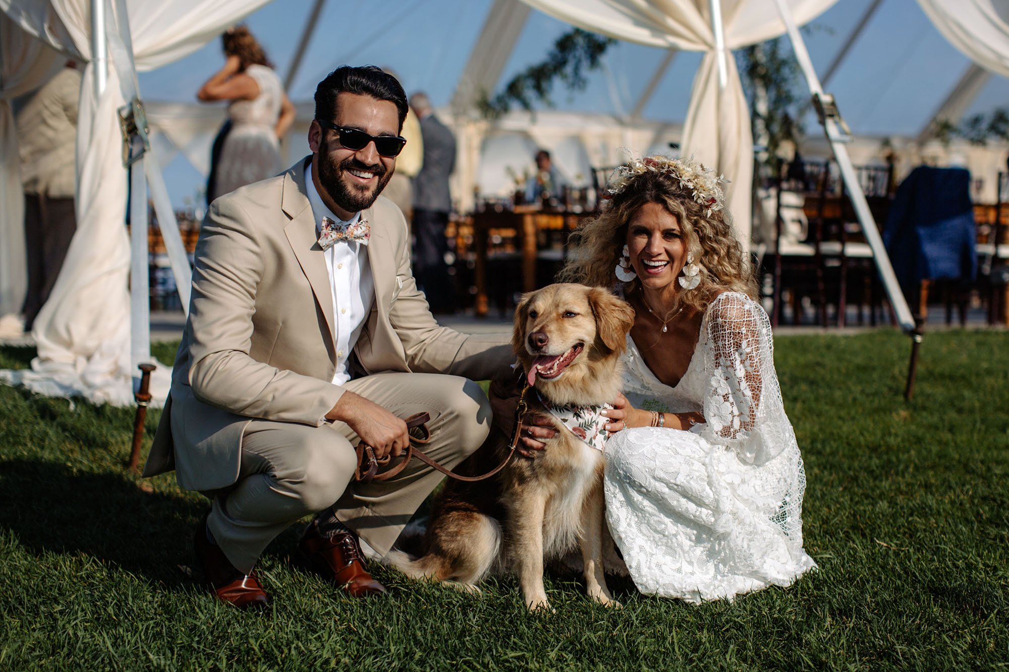 claire and derek with their dog at bay view weddings